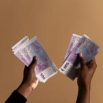 hands holding money